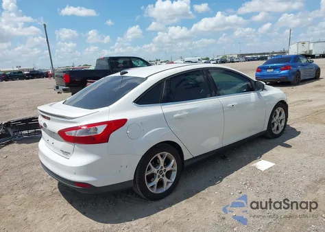 2013 Ford Focus Titanium z USA, uszkodzony, nr VIN 1FADP3J28DL163567